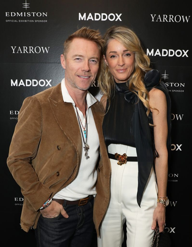 Ronan Keating standing with Storm Keating