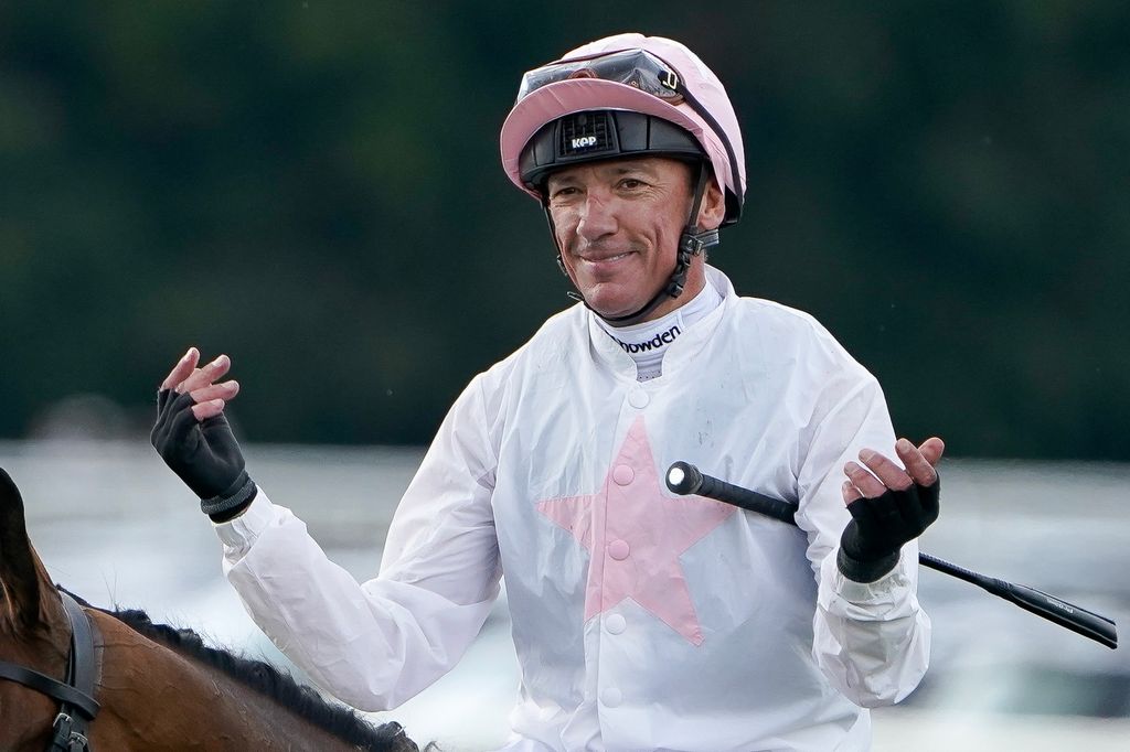 Frankie Dettori celebrates after riding Absurds to victory