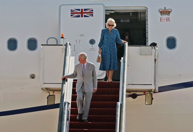 duchess camilla prince charles step off plane