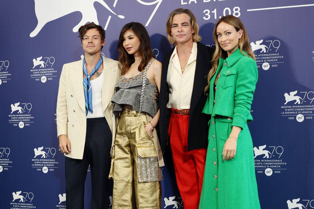 four people posing at film premiere