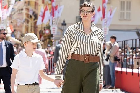 Priness Charlene of Monaco and her son Prince Jacques walk hand-in-hand in Monaco