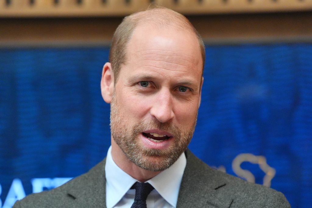 close-up of bearded man in suit