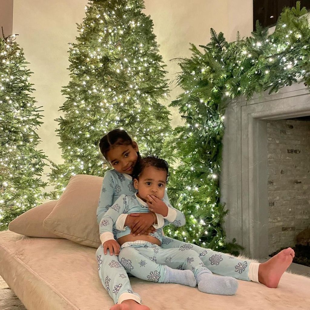 Khloe's kids pose against the lavish Christmas decor