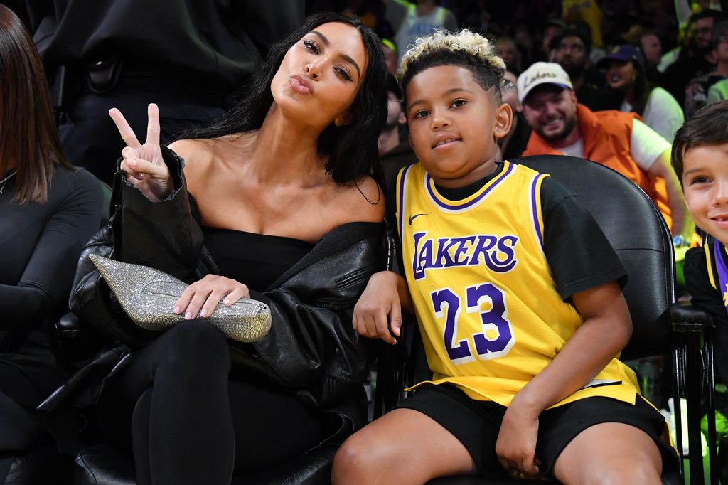 Kim Kardashian and Saint West attend a basketball game between the Los Angeles Lakers and the Phoenix Suns at Crypto.com Arena on December 05, 2023 in Los Angeles, California.