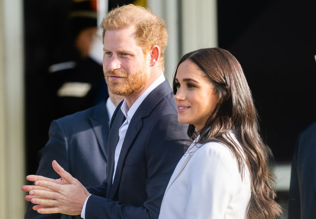 Harry and Meghan in blazers 