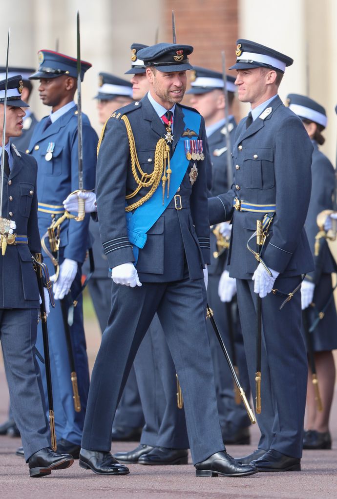 Prince William, Prince of Wales inspects the Guard of Honour ahead of the Sovereign's Parade on behalf of King Charles III at the Royal Air Force College in Cranwell 