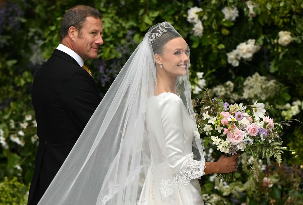 Olivia wore the Faberge Myrtle Leaf Tiara made for Grosvenor brides to wear on their wedding day, which has been in the family since 1906.

Her bouquet was made of flowers picked from the gardens of the duke’s family home, Eaton Hall.