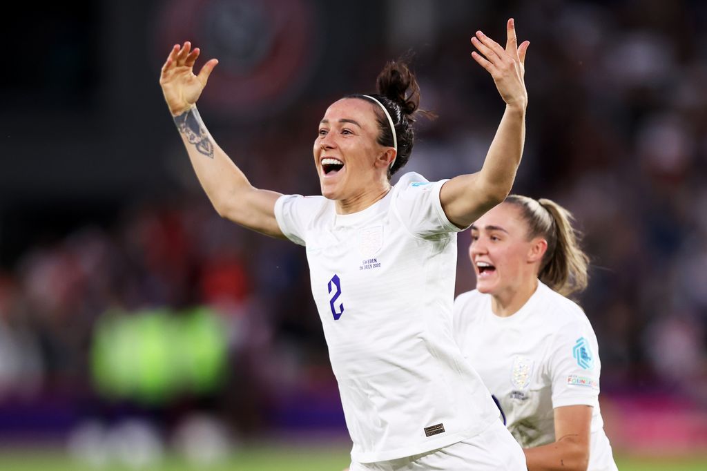 Lucy Bronze celebrating on pitch 