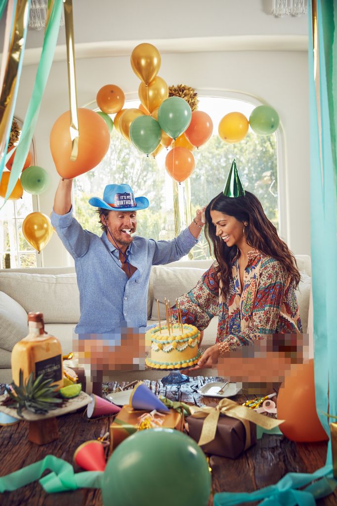 Matthew McConaughey and Camila Alves cut a birthday cake for Pantalones