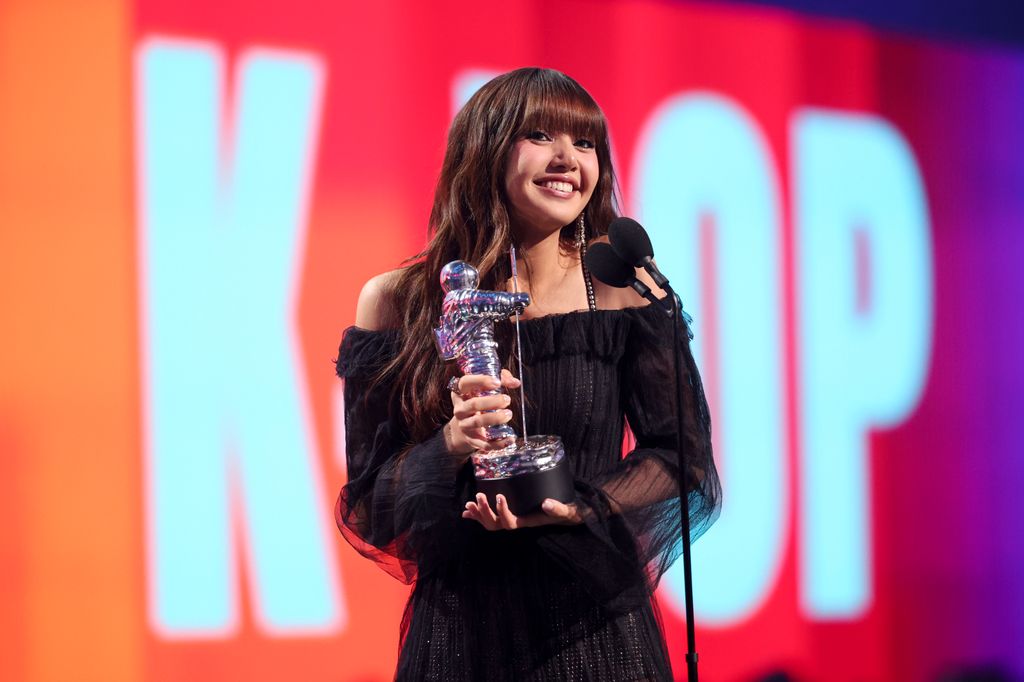 Lisa accepts the Best K-Pop award for "Rockstar" onstage at the 2024 MTV Video Music Awards