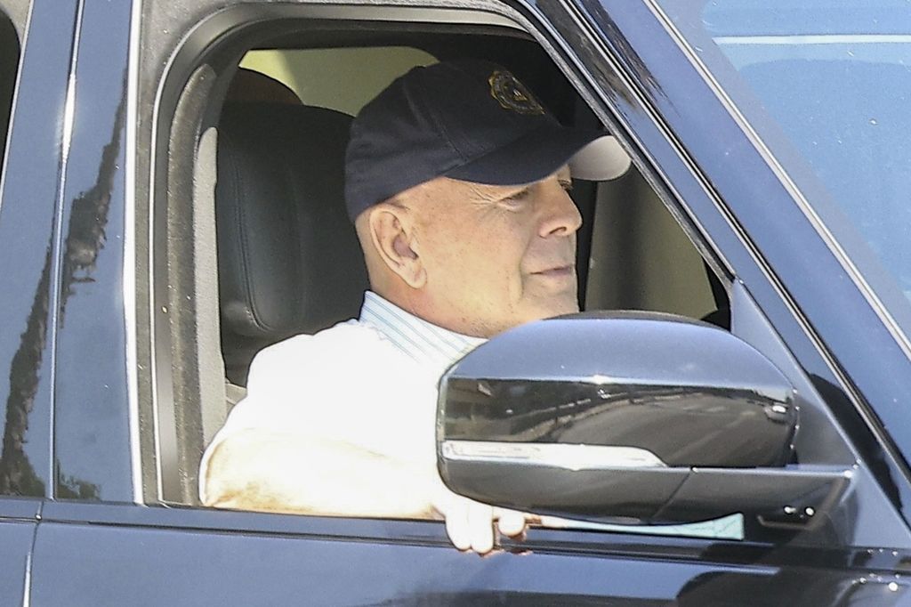 Bruce Willis, diagnosed with dementia, enjoys a ride through Studio City with his bodyguards.