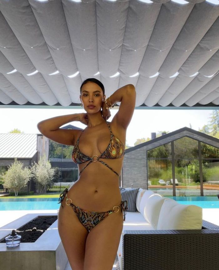 Maya Jama in string bikini in front of pool