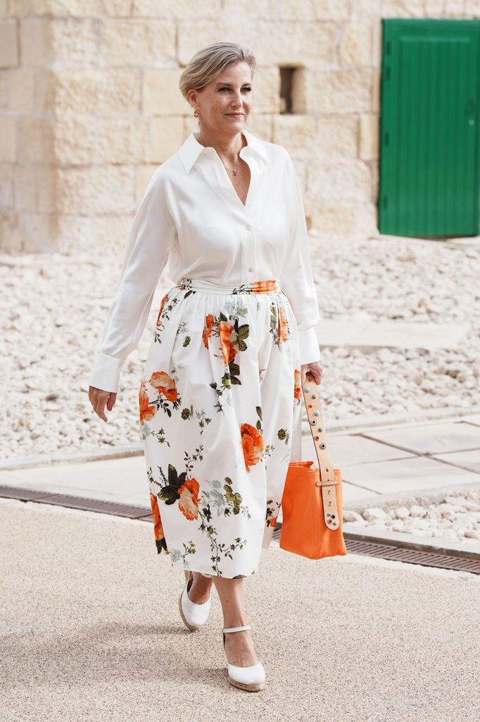 The Duchess of Edinburgh in white shirt and orange and white floral skirt