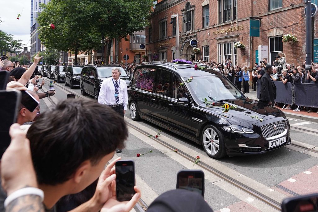 BIRMINGHAM, UNITED KINGDOM - JULY 30: The funeral cortege of Ozzy Osbourne arrives at the Black Sabbath Bridge bench in Birmingham, United Kingdom on July 30, 2025. Ozzy Osbourne, the iconic frontman of Black Sabbath and one of the most towering figure in the history of heavy metal, has died at the age of 76. (Photo by Ioannis Alexopoulos/Anadolu via Getty Images)