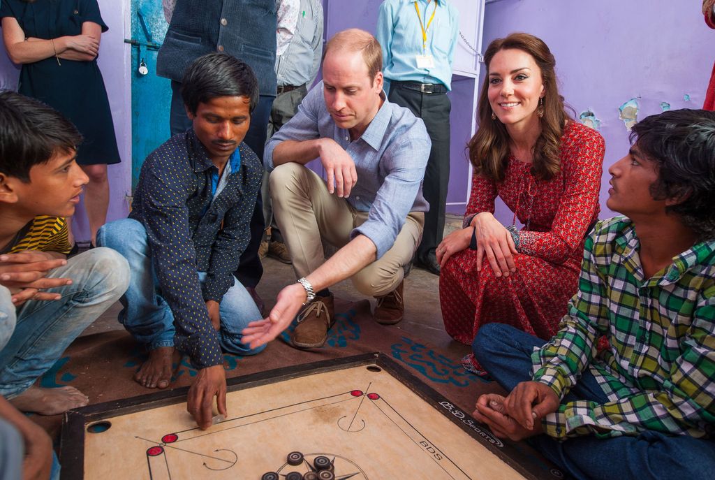William and Kate playing games with street children in New Delhi