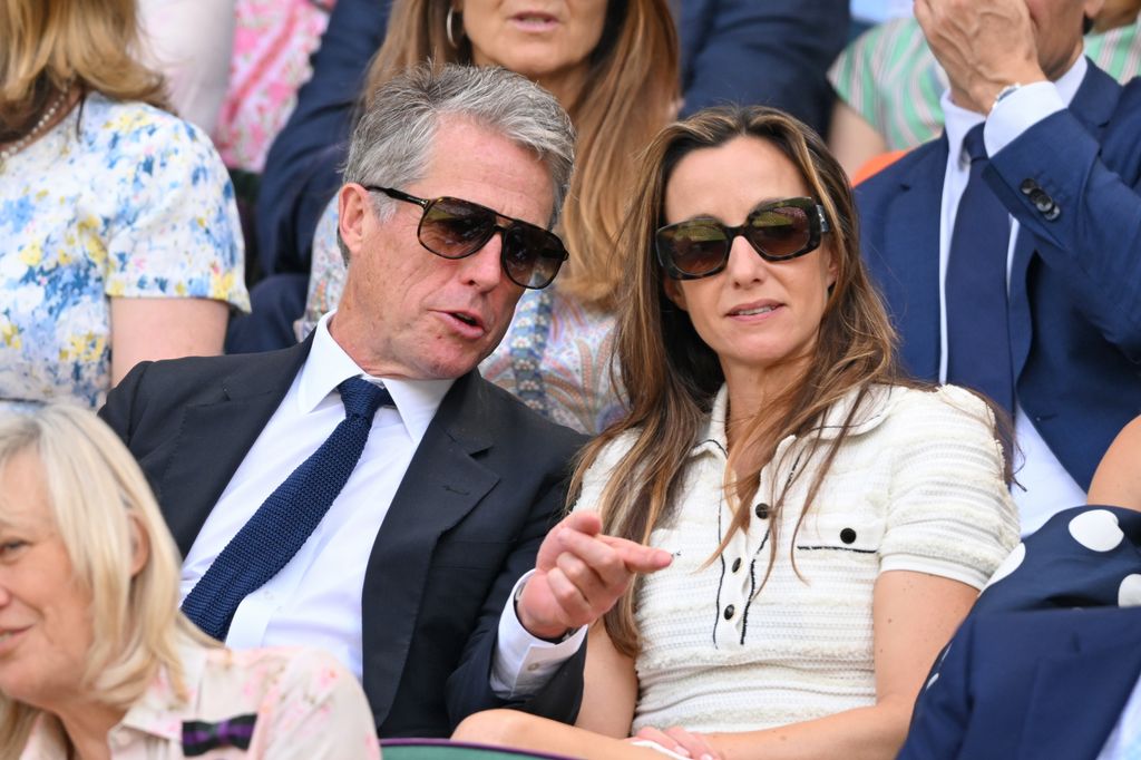 hugh grant with wife Anna at Wimbledon