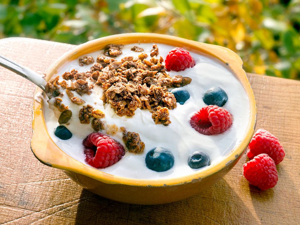 yogurt berries granola outside