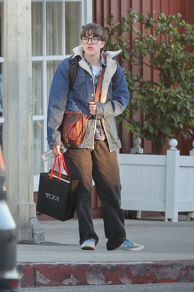 Fin sported bangs and pigtails in new photos