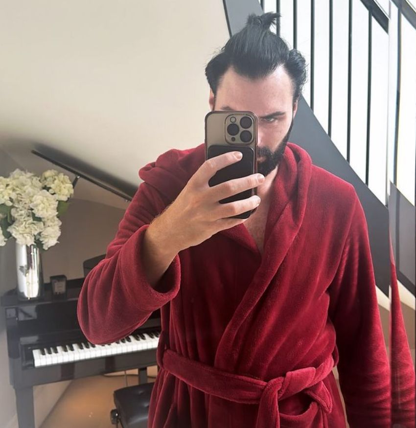 Rylan Clark in a red dressing gown