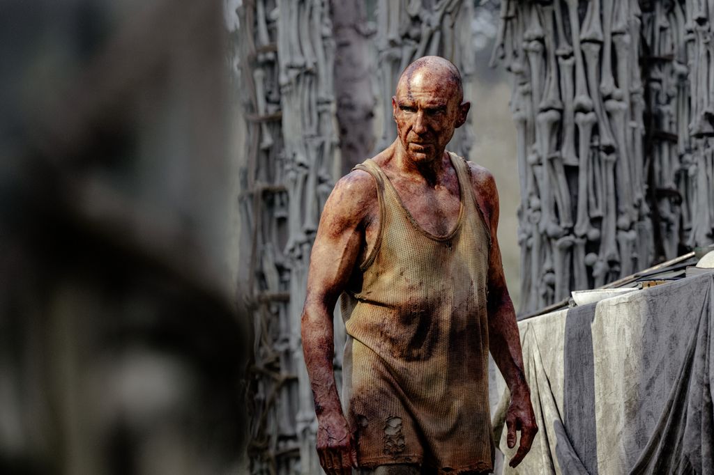 Ralph Fiennes plays Dr. Ian Kelson in 28 Years Later