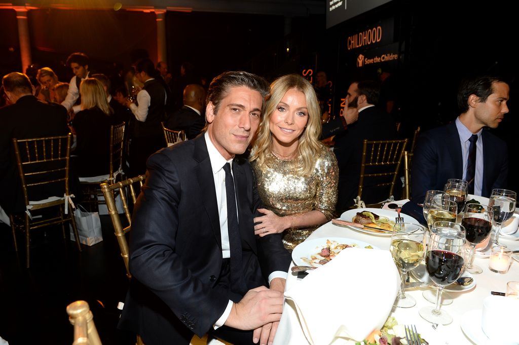 David Muir and Kelly Ripa pose at the 6th Annual Save the Children Illumination Gala at the American Museum of Natural History on November 14, 2018 in New York City.