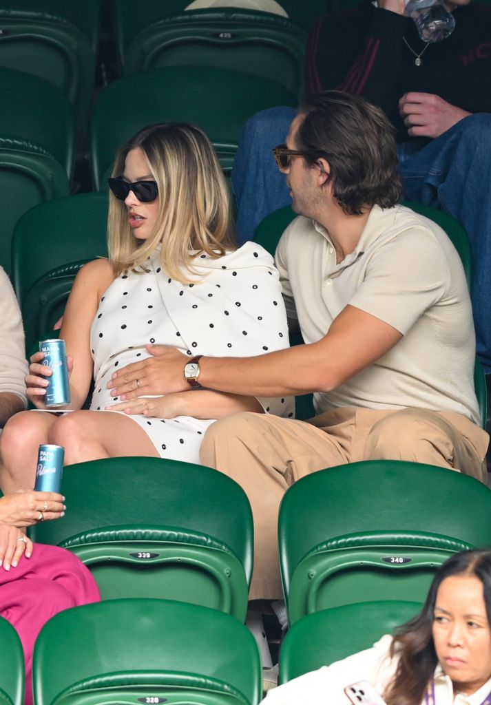 Margot Robbie and Tom Ackerley court-side of Centre Court on day twelve of the Wimbledon Tennis Championships at the All England Lawn Tennis and Croquet Club on July 12, 2024 in London, England