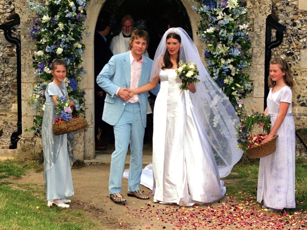 Celebrity television chef Jamie Oliver and his wife Jools after their wedding ceremony at All Saints Church, Rickling, in Essex. 