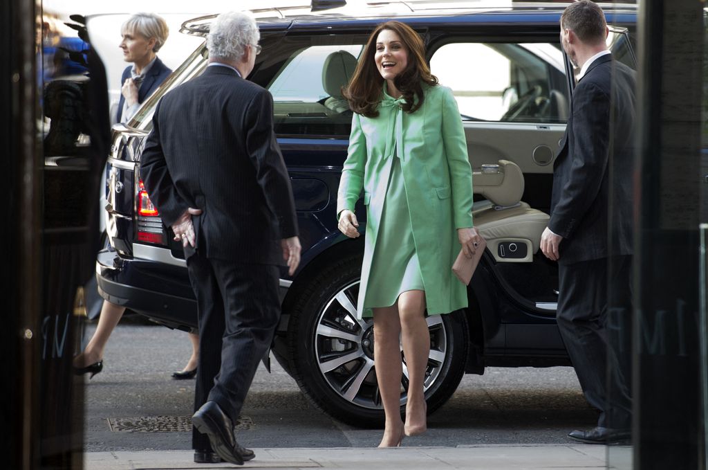 Princess of Wales in green coat departing from car