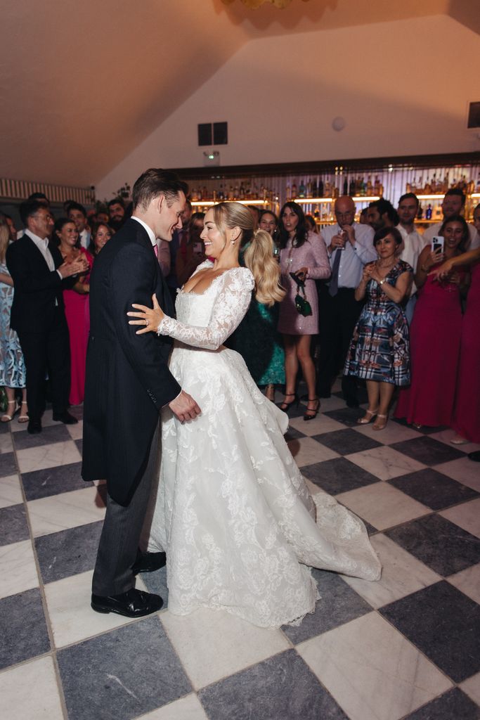 Alice Liveing dancing with her husband on their wedding day