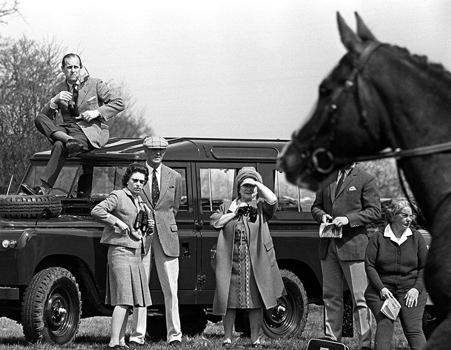 prince philip sitting on land rover