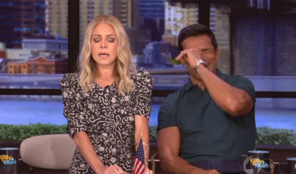 Kelly making horrified face on LIVE