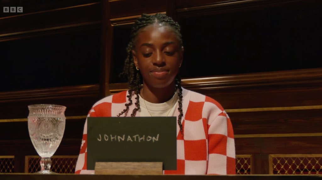 woman sitting at table