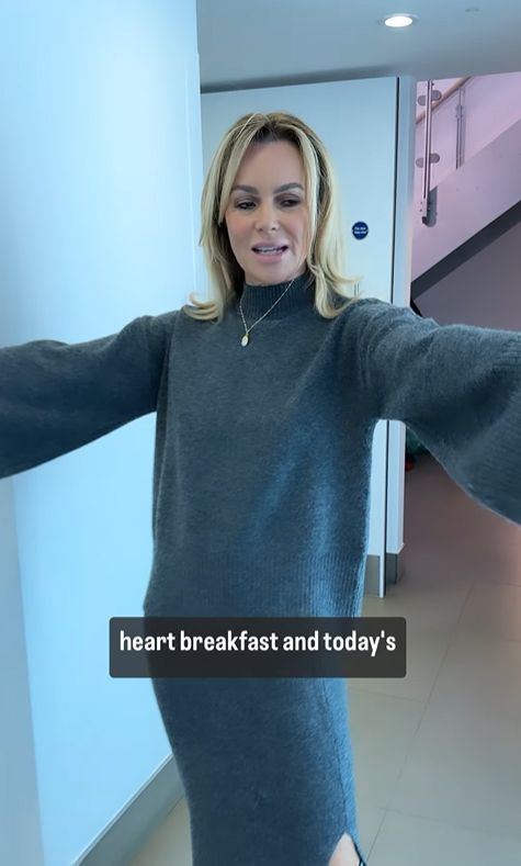 Amanda Holden in a grey jumper and matching skirt
