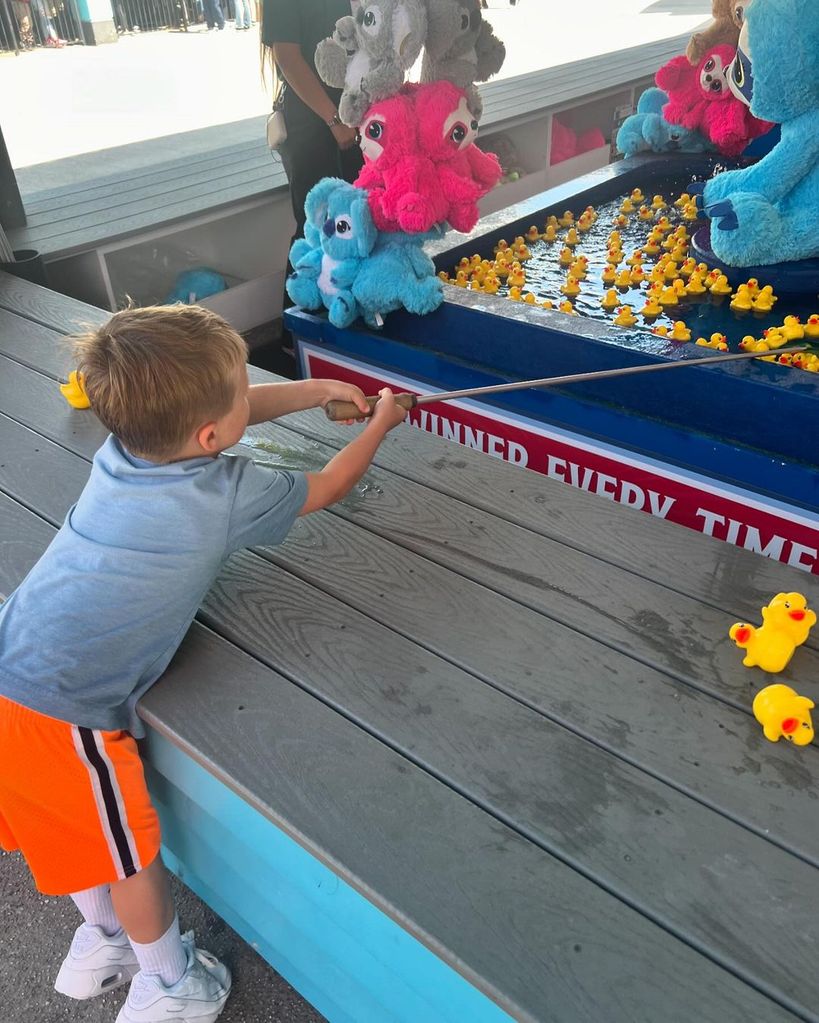 Carrie Underwood's son played hook a duck during their day out 