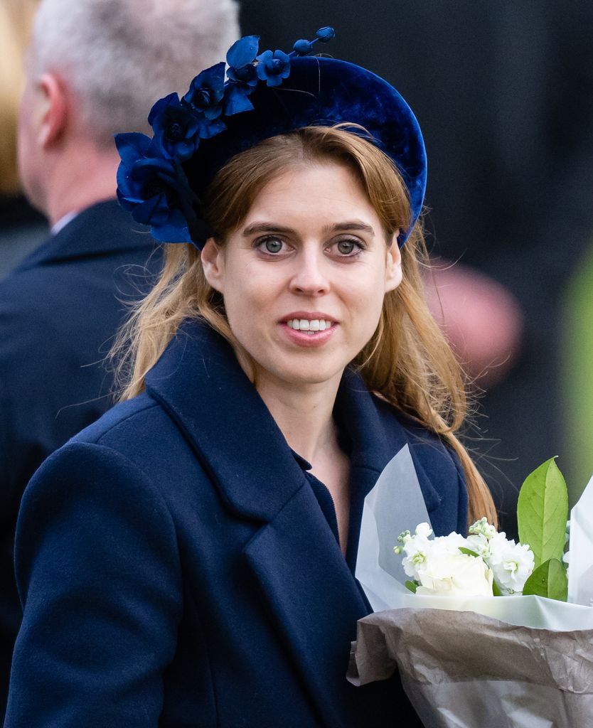 Princess Beatrice at Christmas Day event in navy headband