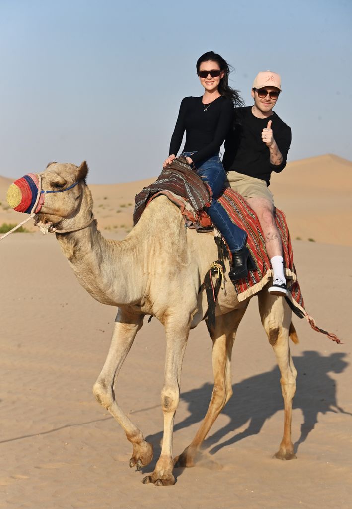 The couple enjoyed a romantic camel ride