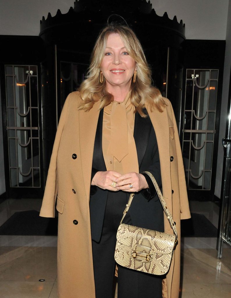 Kirsty Young wearing a smart camel coat