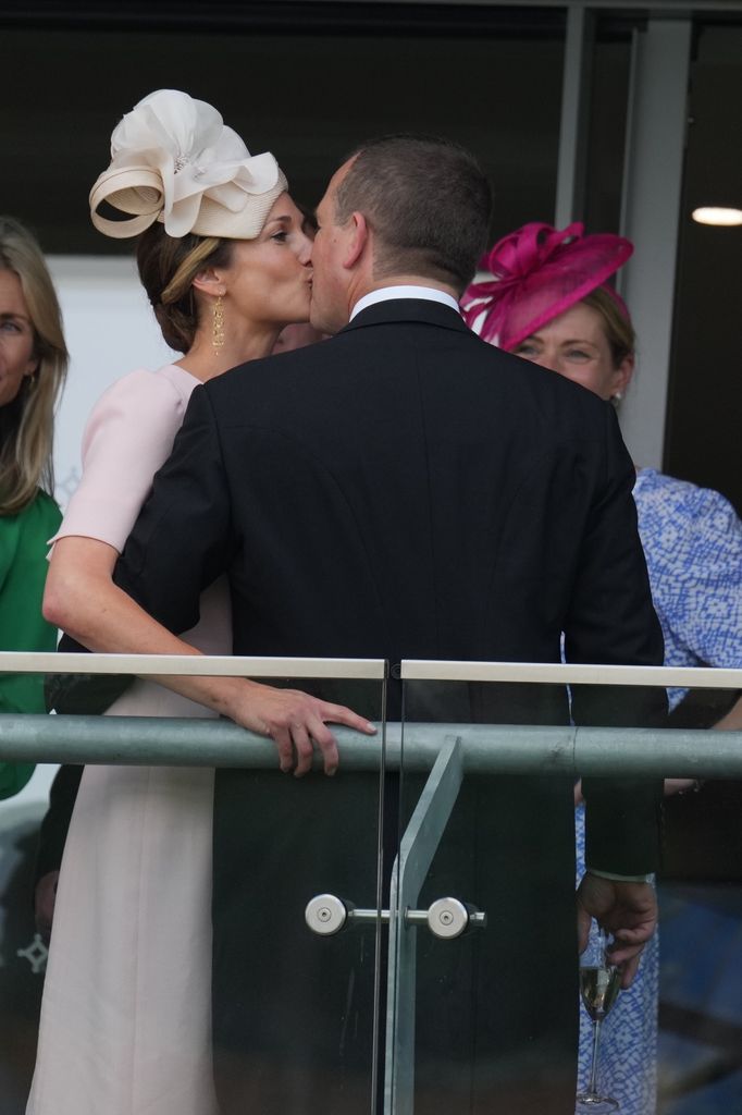 Harriet Sperling and Peter Phillips kiss at Royal Ascot