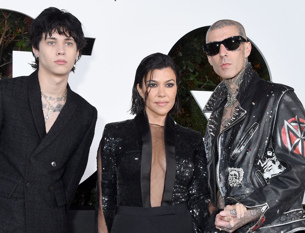 Landon Asher Barker, Kourtney Kardashian, and Travis Barker attend the 2022 GQ Men Of The Year Party on November 17, 2022 in West Hollywood, California