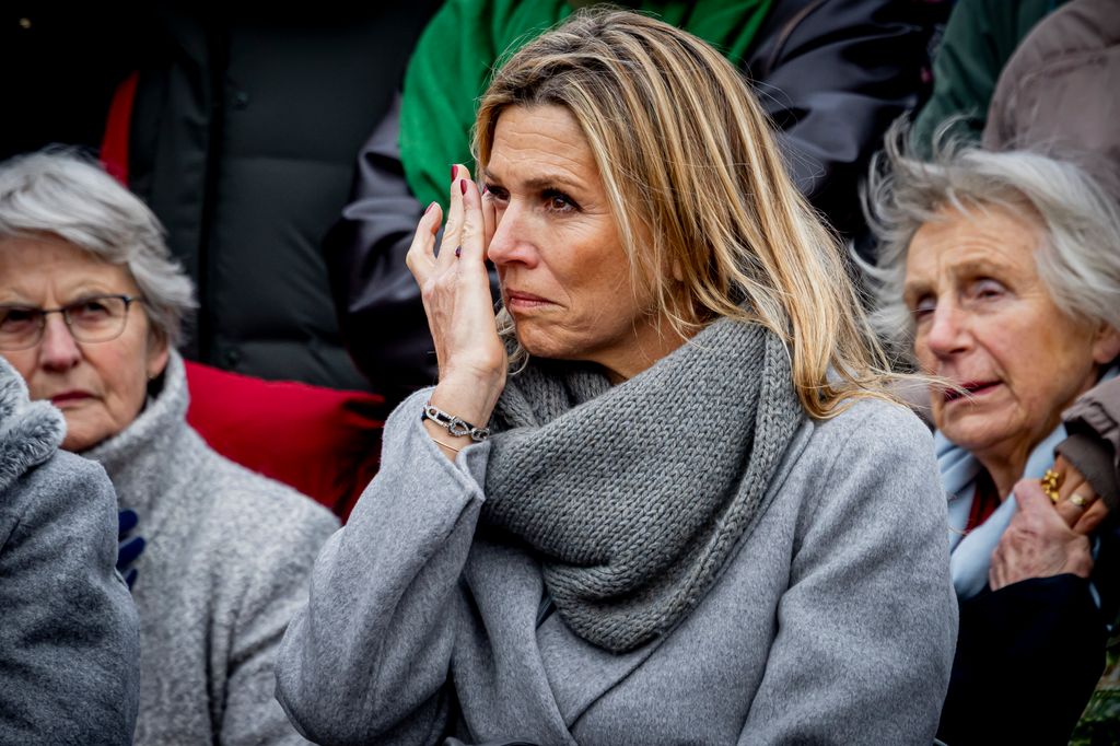 Queen Maxima of The Netherlands appeared to wipe a tear away