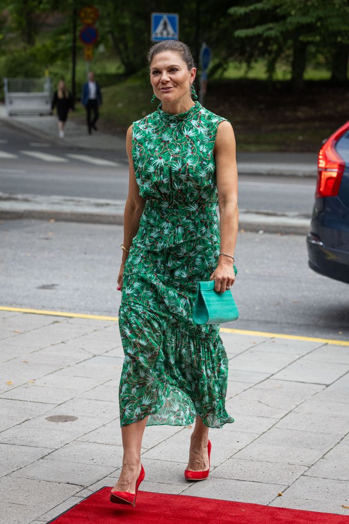Crown Princess Victoria in green dress and red shoes