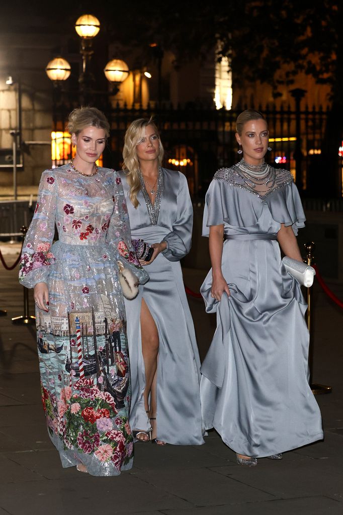 Lady Kitty Spencer walking with Lady Eliza and Lady Amelia Spencer