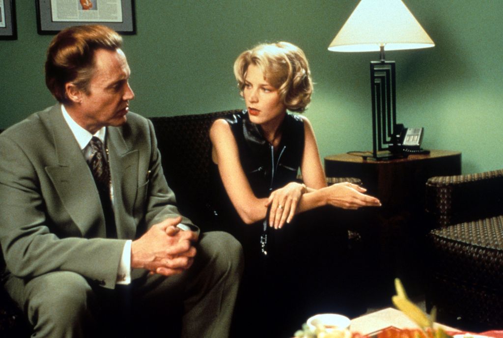 Christopher Walken sits with Bridget Fonda 