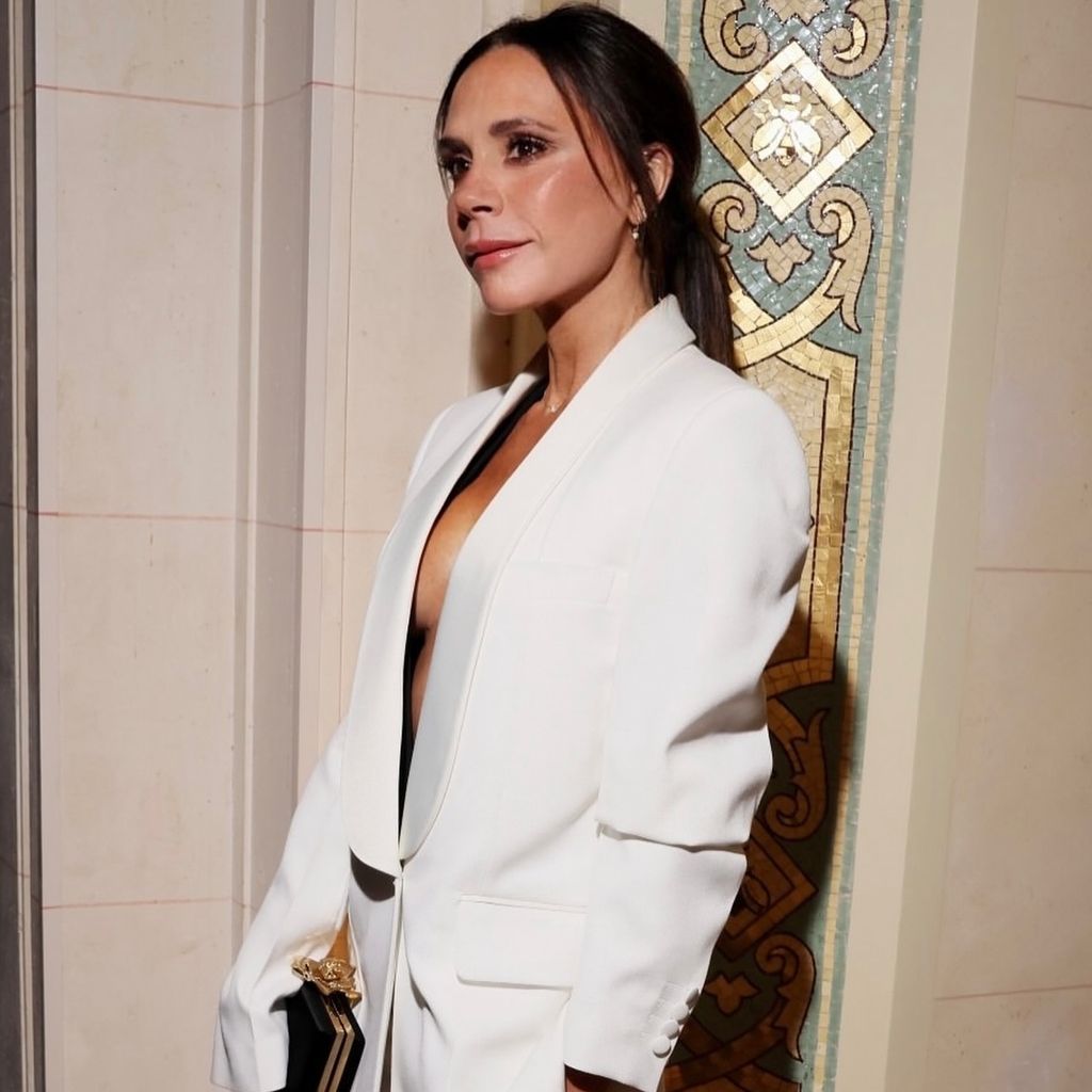 Victoria Beckham wearing a white suit