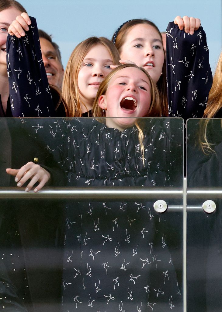 A photo of Mia Tindall cheerring