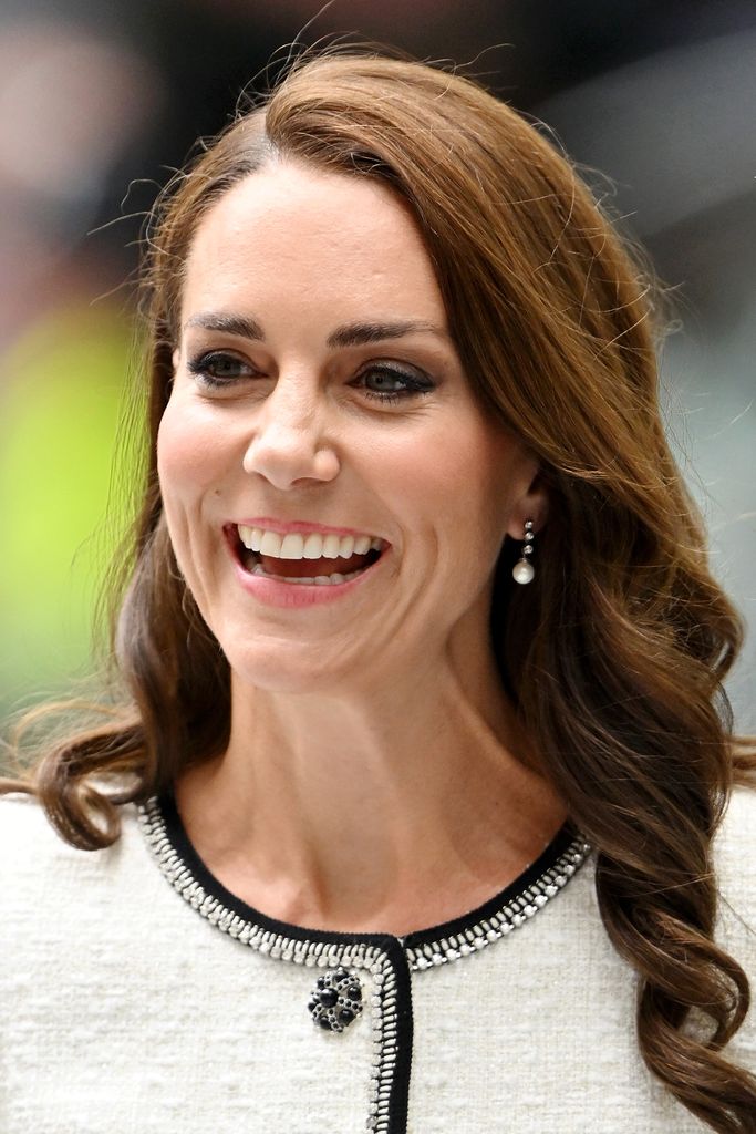 Kate Middleton smiles at the opening of the National Portrait Gallery