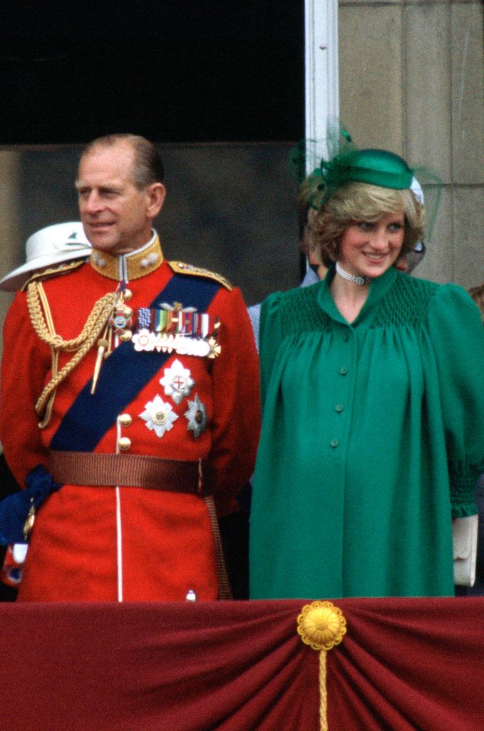 Prince Philip standing next to a pregnant Princess Diana