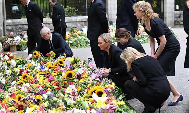 Zara Tindall crying at floral tributes to the Queen