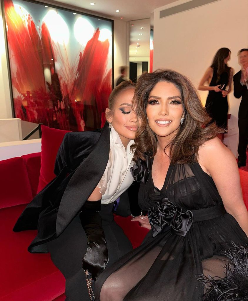 Sleepy Jennifer Lopez leans towards her glamorous sister Lynda Lopez at the Met Gala AfterParty