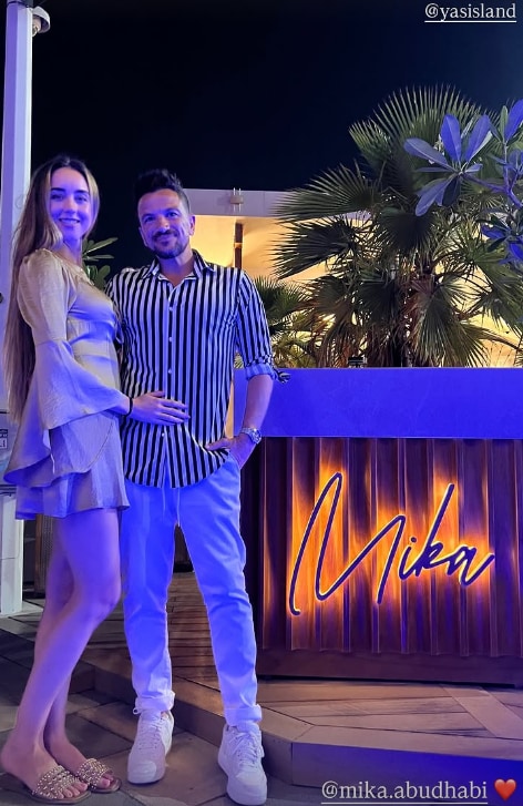 emily and peter andre stand side by side outside Dubai restaurant